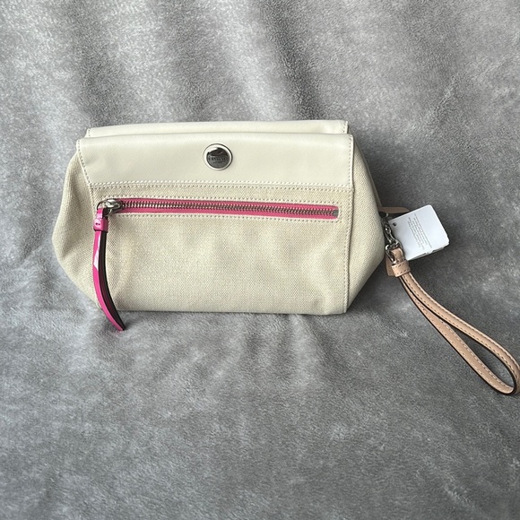 Coach Handbags - NWT Coach boxy clutch, natural with pink interior